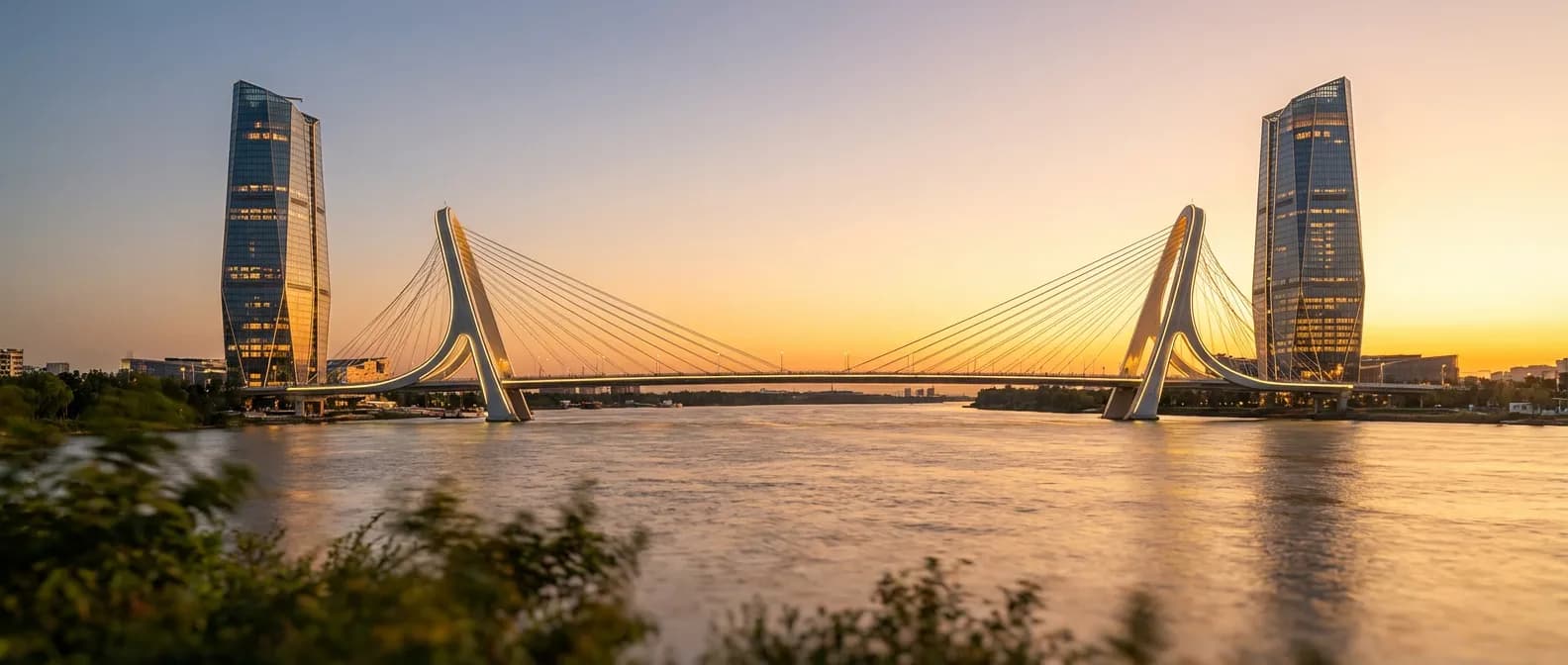 Pont moderne reliant deux tours en verre au crépuscule symbolisant la transition du CDD au CDI