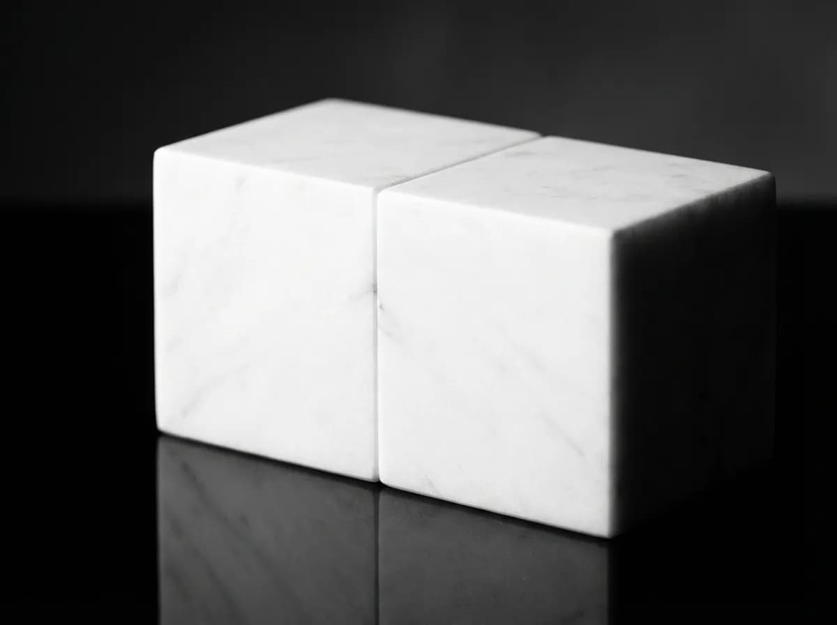 Blocs de marbre s'emboîtant parfaitement, symbole minimaliste de la TUP